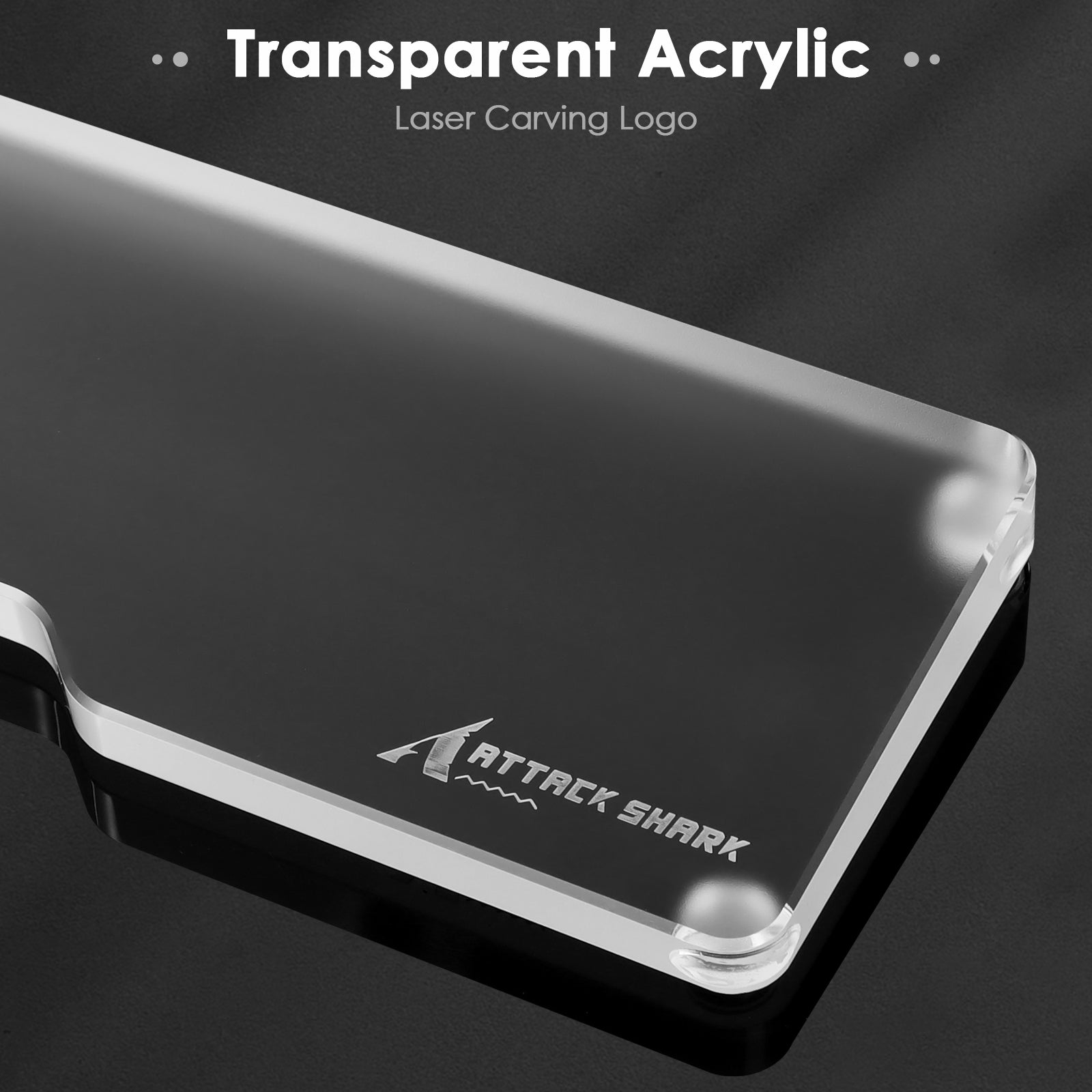 Close-up of transparent acrylic wrist rest with Attack Shark logo carved