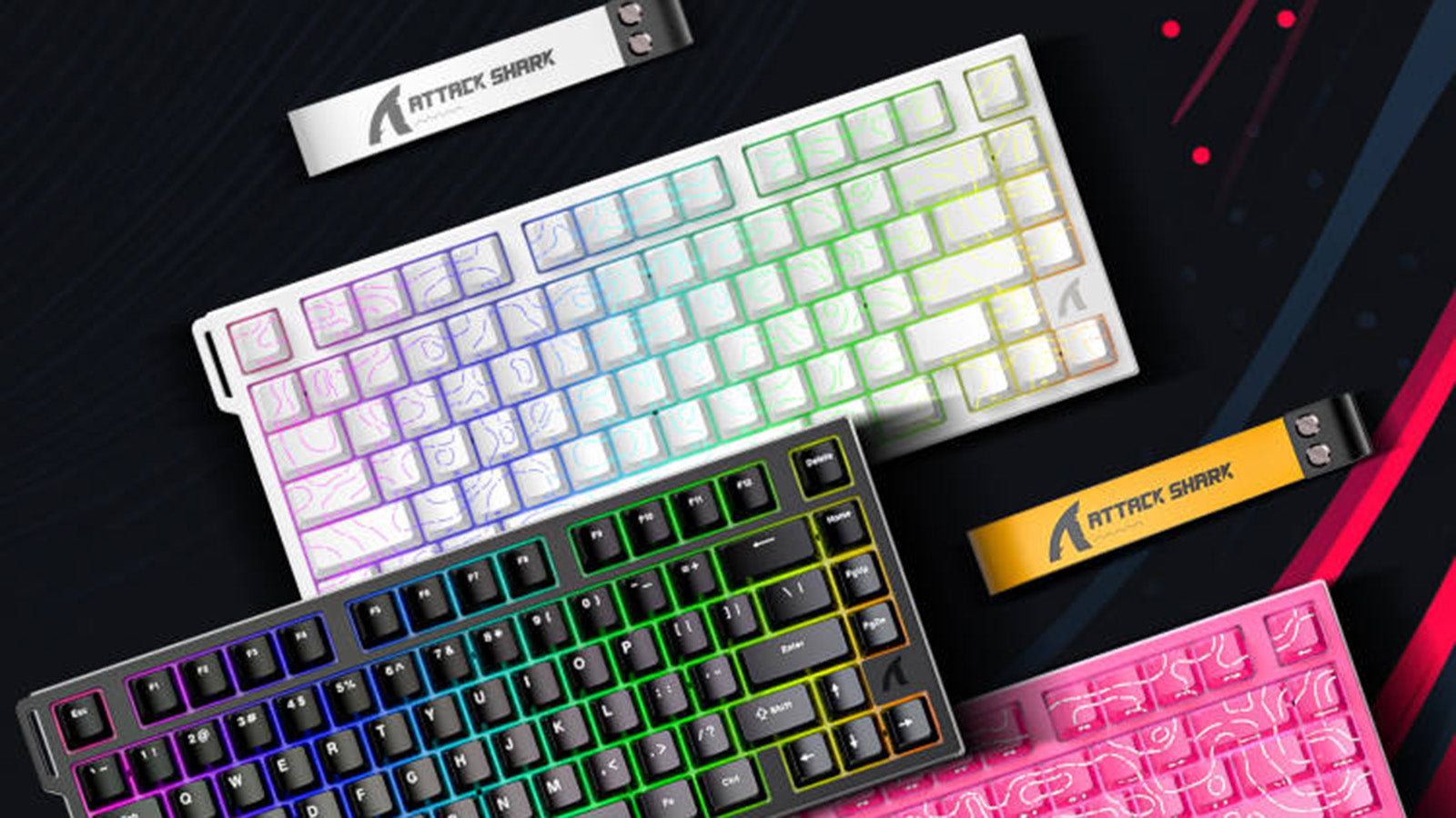 Angled top view of an Attack Shark branded mechanical keyboard showing multiple key rows and the printed logo on the case